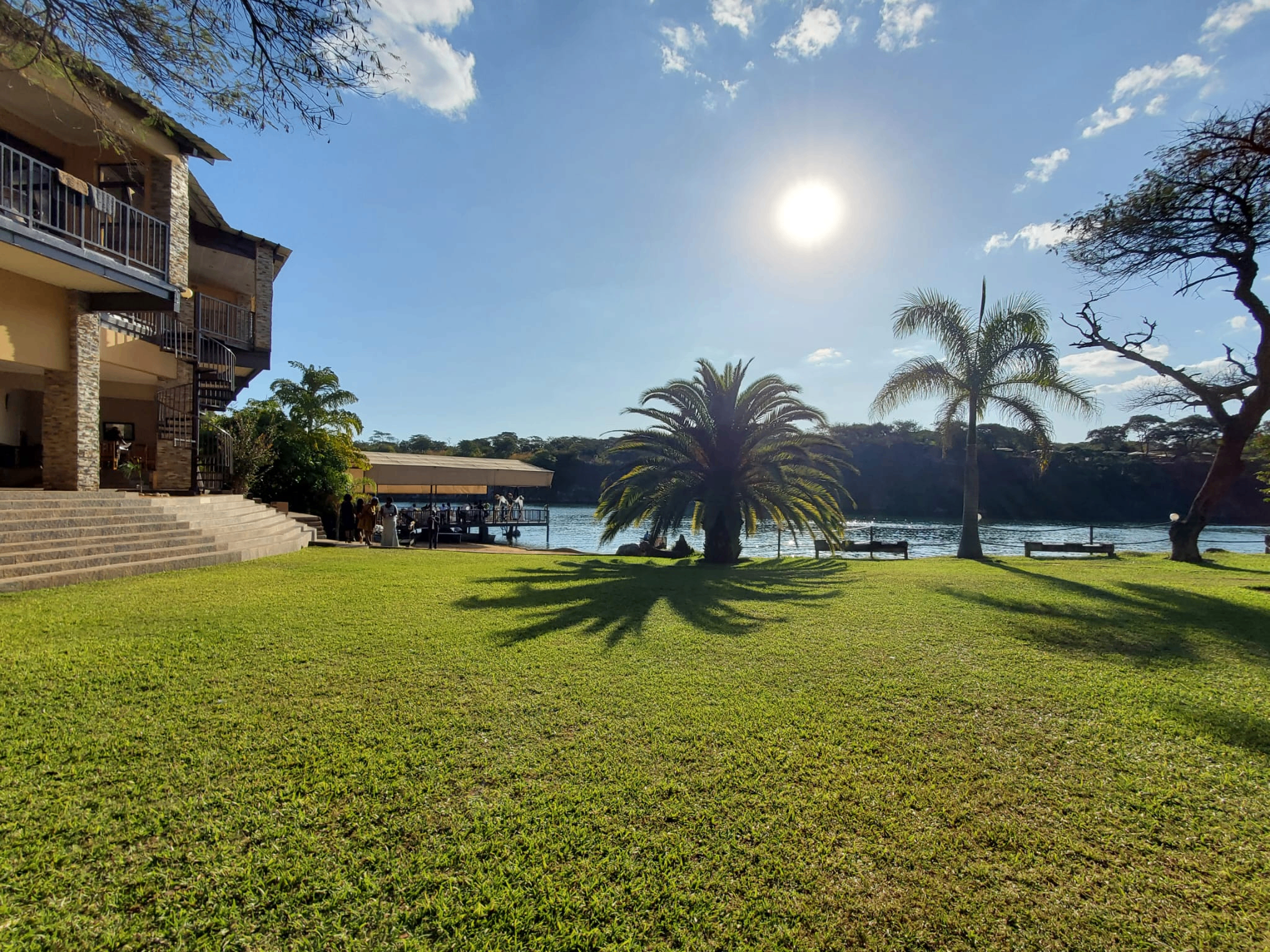 Green riverside landscape in Zambia with sunshine